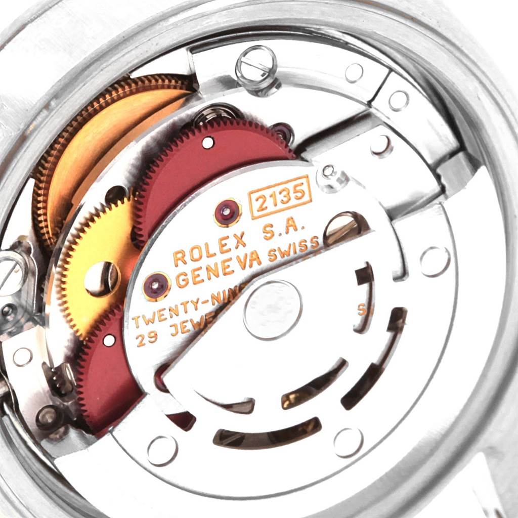 This image shows a close-up view of the mechanical movement inside a Rolex Date 69160 Women's Stainless Steel Blue Dial 69160 Women's Stainless Steel Blue Dial model watch.