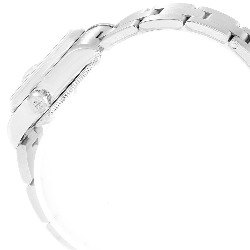 The image shows a side view of the Rolex Date 79160 Women's Stainless Steel Pink Dial 79160 Women's Stainless Steel Pink Dial model watch, highlighting the crown, case, and part of the bracelet.