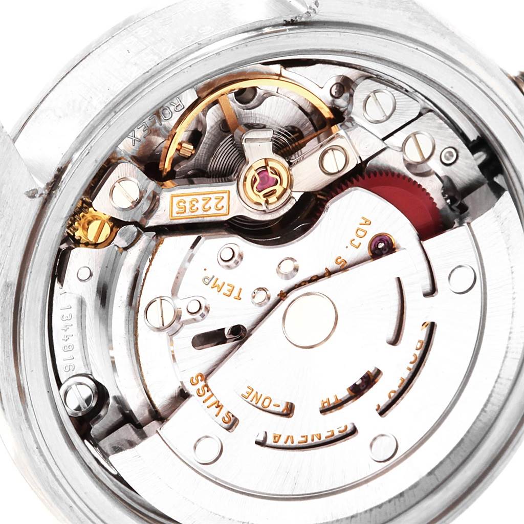 This is an internal view of a Rolex Date 79160 Women's Stainless Steel Pink Dial 79160 Women's Stainless Steel Pink Dial model showing the movement mechanism and gears.