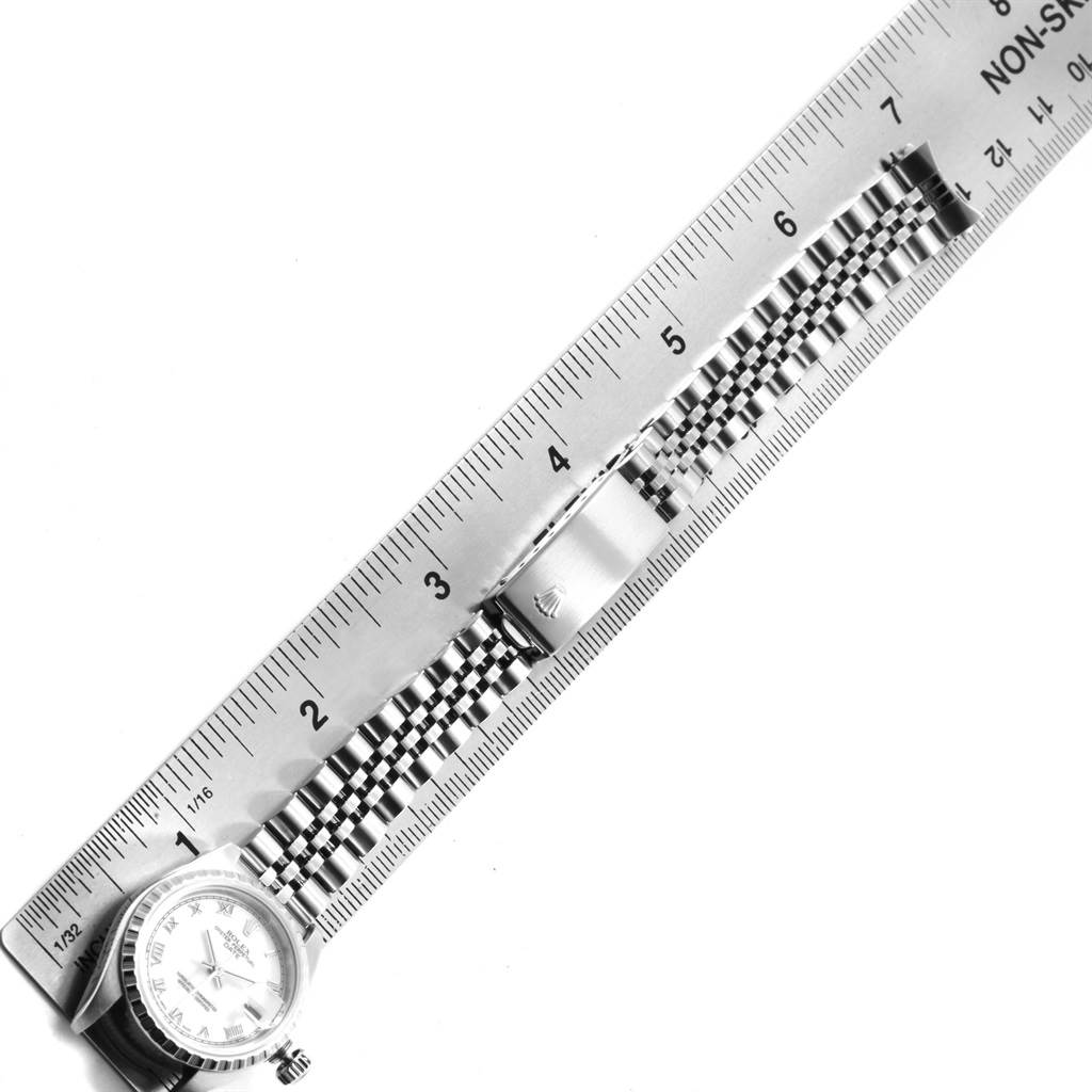 The image shows a Rolex Date 79240 Women's Stainless Steel White Dial 79240 Women's Stainless Steel White Dial model watch with a stainless steel bracelet, measured against a ruler from a top-down angle.