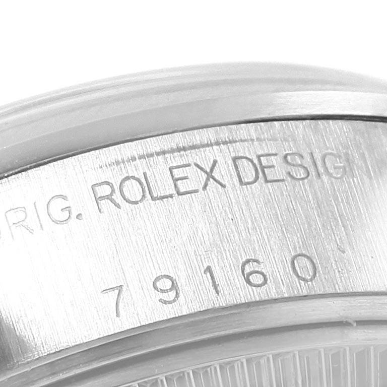 This image shows a close-up of the case engraving of a Rolex Date 79160 Women's Stainless Steel Silver Dial 79160 Women's Stainless Steel Silver Dial model watch with the model number 79160.
