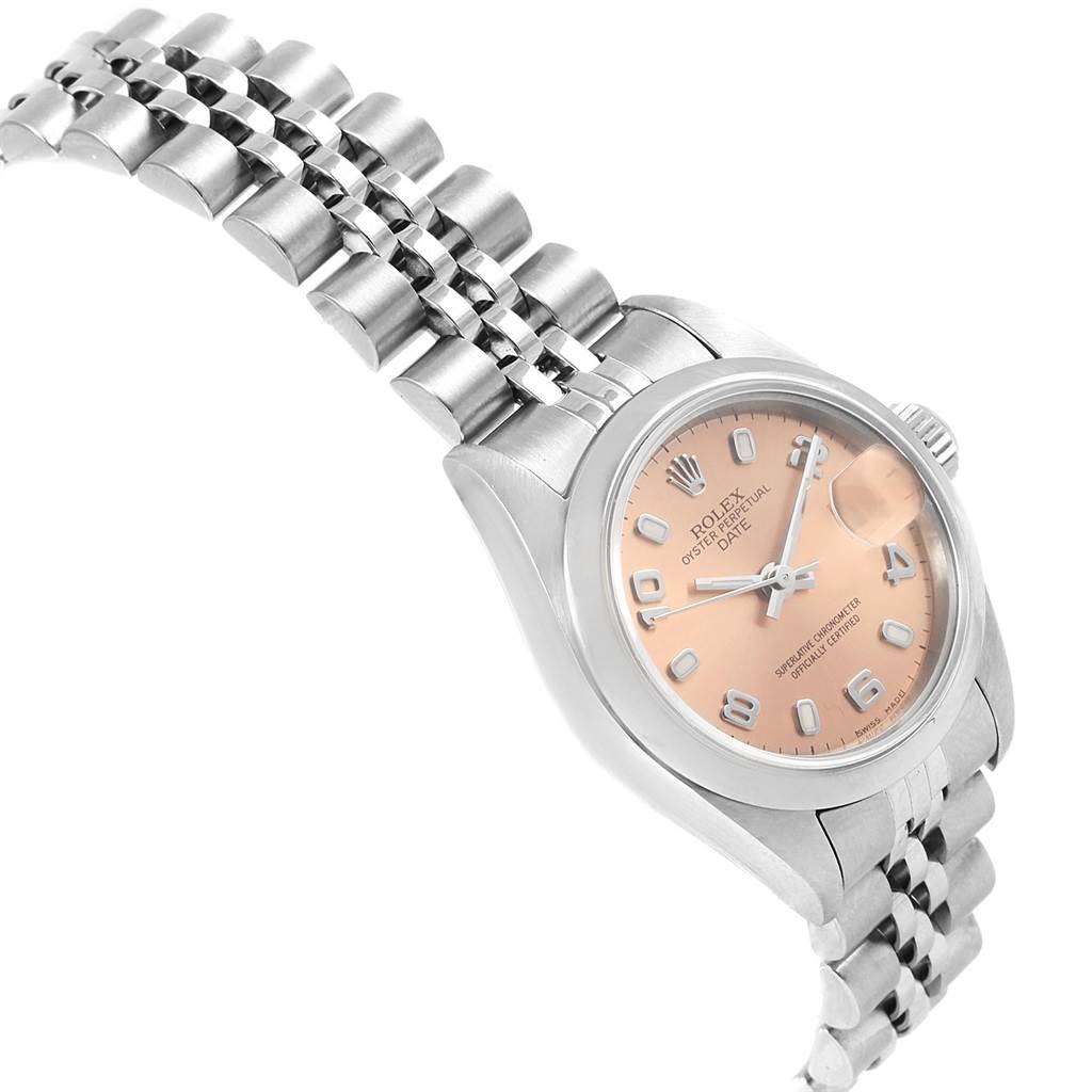 The Rolex Date 79160 Women's Stainless Steel Pink Dial 79160 Women's Stainless Steel Pink Dial model watch is shown at an angle displaying the face, casing, and part of the metal bracelet.