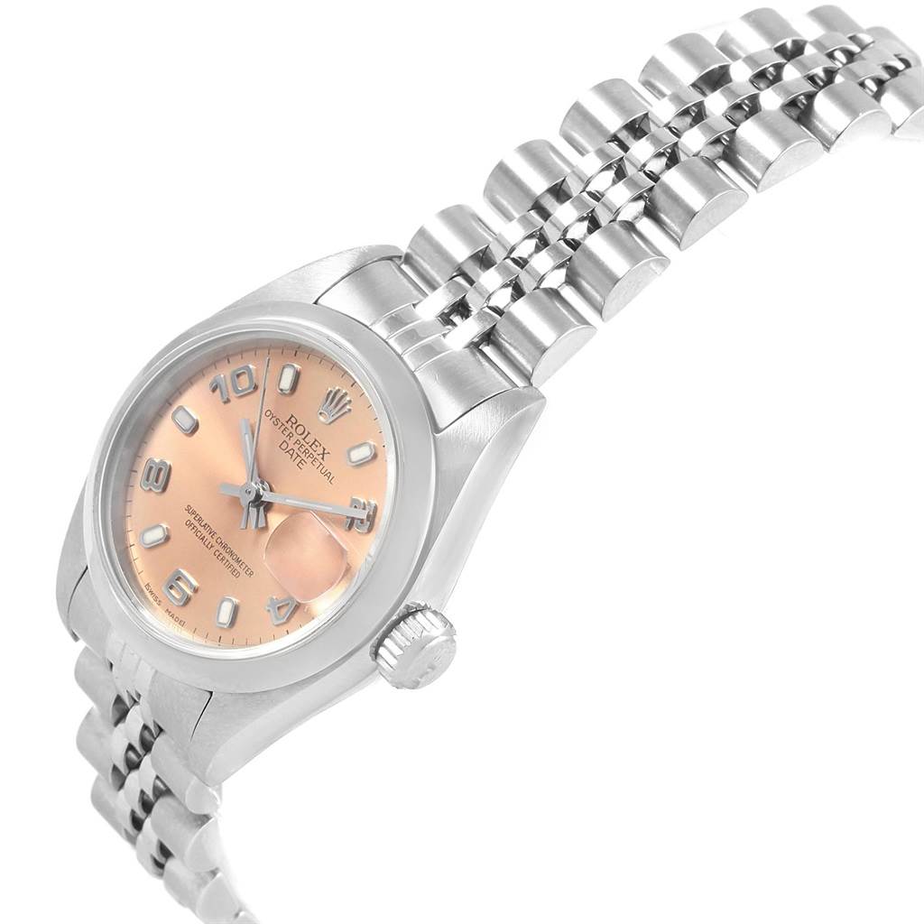 This Rolex Date 79160 Women's Stainless Steel Pink Dial 79160 Women's Stainless Steel Pink Dial model is shown at an angle highlighting the dial, crown, and part of the metal bracelet.