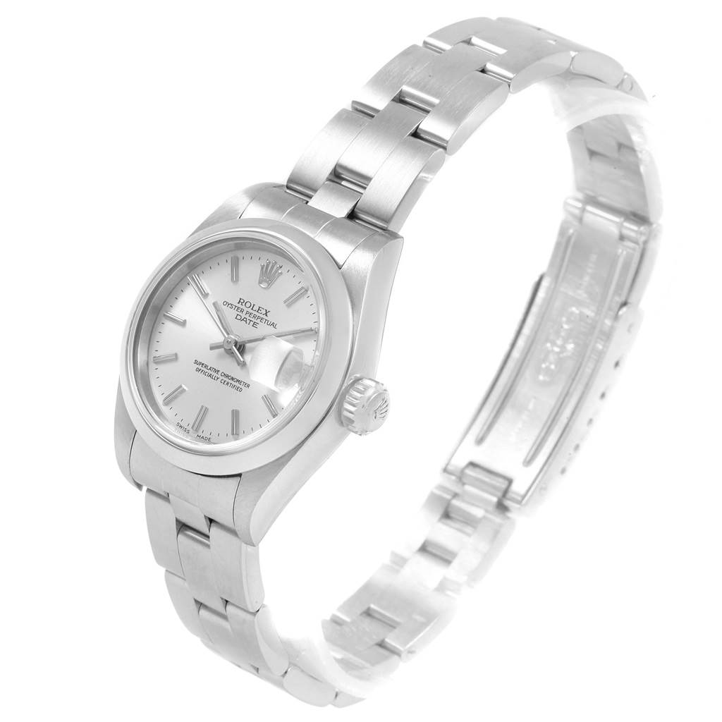The image shows a side angle of a Rolex Date 69160 Women's Stainless Steel Silver Dial 69160 Women's Stainless Steel Silver Dial model watch, highlighting the face, crown, and stainless steel bracelet.
