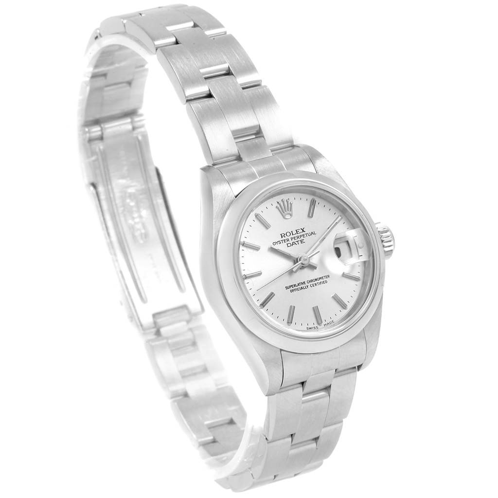 The image shows a Rolex Date 69160 Women's Stainless Steel Silver Dial 69160 Women's Stainless Steel Silver Dial model watch at a slight angle, highlighting the dial, bracelet, and partially open clasp.