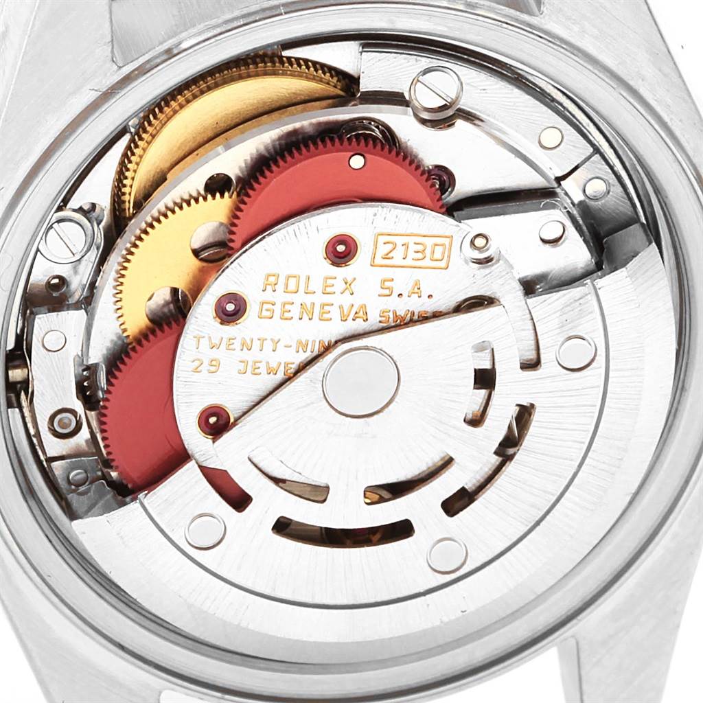 The image shows the internal movement mechanism and gears of the Rolex Date 69160 Women's Stainless Steel Silver Dial 69160 Women's Stainless Steel Silver Dial model watch.
