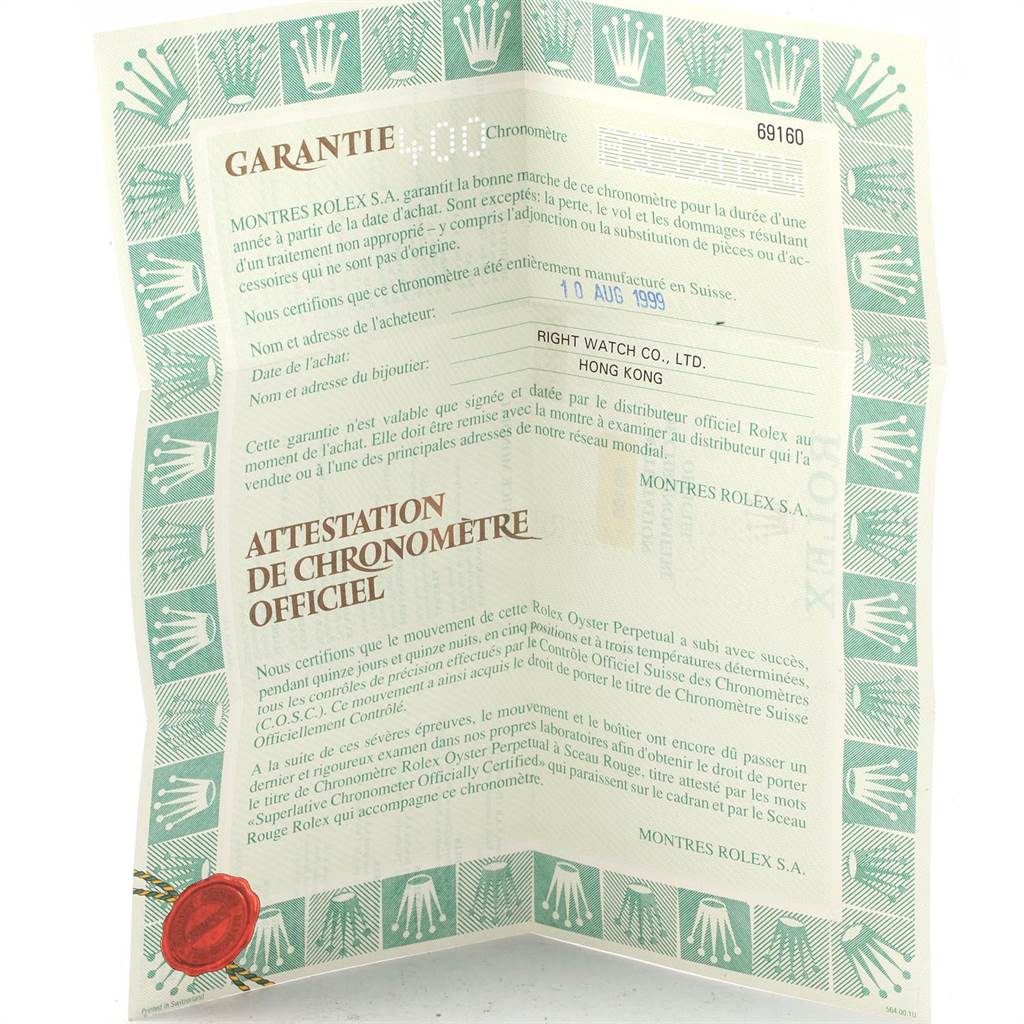 The image shows a warranty certificate, an accessory for the Rolex Date 69160 Women's Stainless Steel Blue Dial 69160 Women's Stainless Steel Blue Dial model watch.