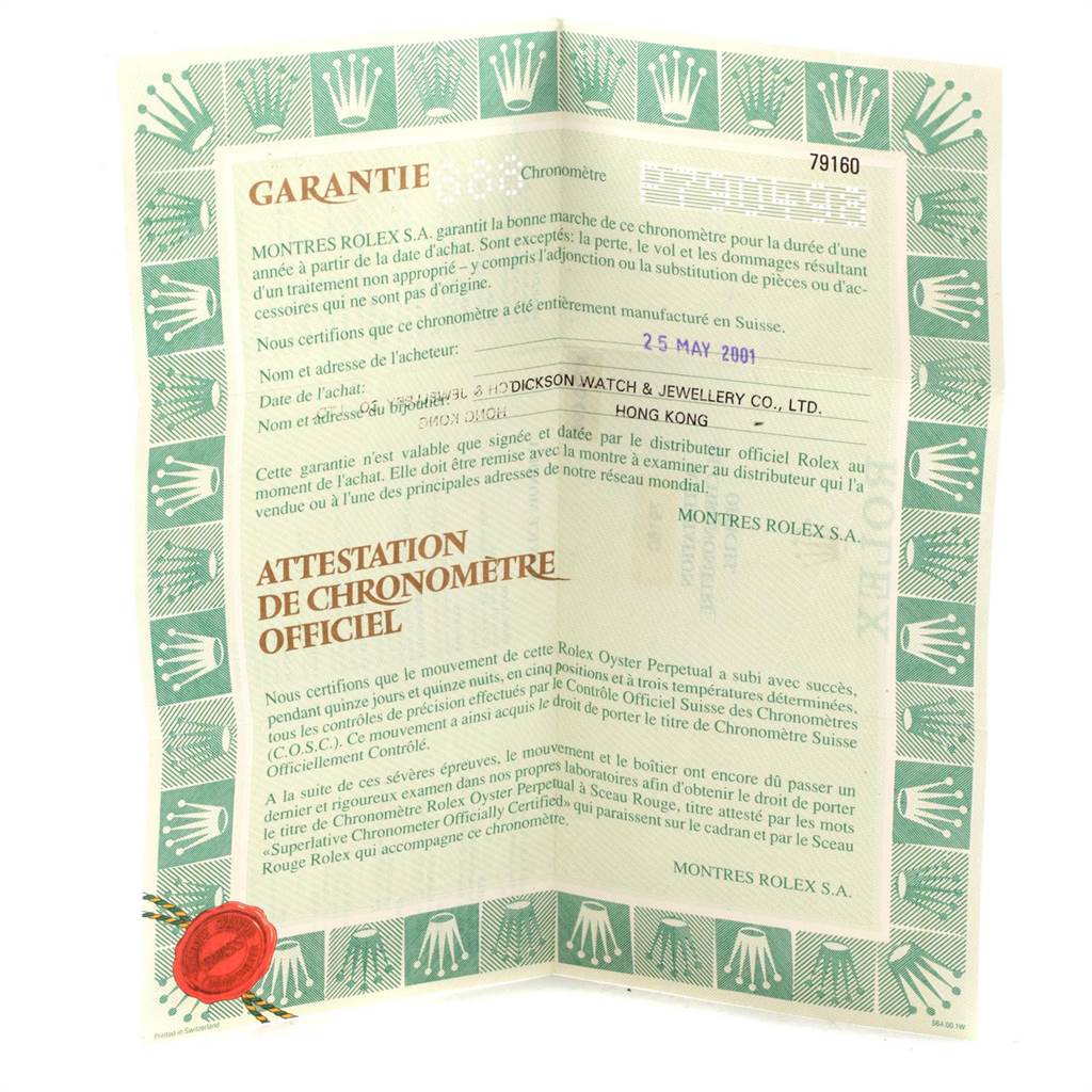 This image shows a certificate of guarantee and official chronometer attestation for a Rolex Date 79160 Women
s Stainless Steel Black Dial 79160 Women
s Stainless Steel Black Dial model watch.