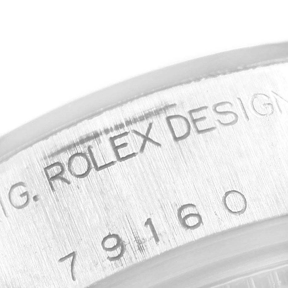 This is a close-up of the case engraving showing the model number and "Rolex Design" inscription for the Rolex Date 79160 Women
s Stainless Steel Black Dial 79160 Women
s Stainless Steel Black Dial watch.