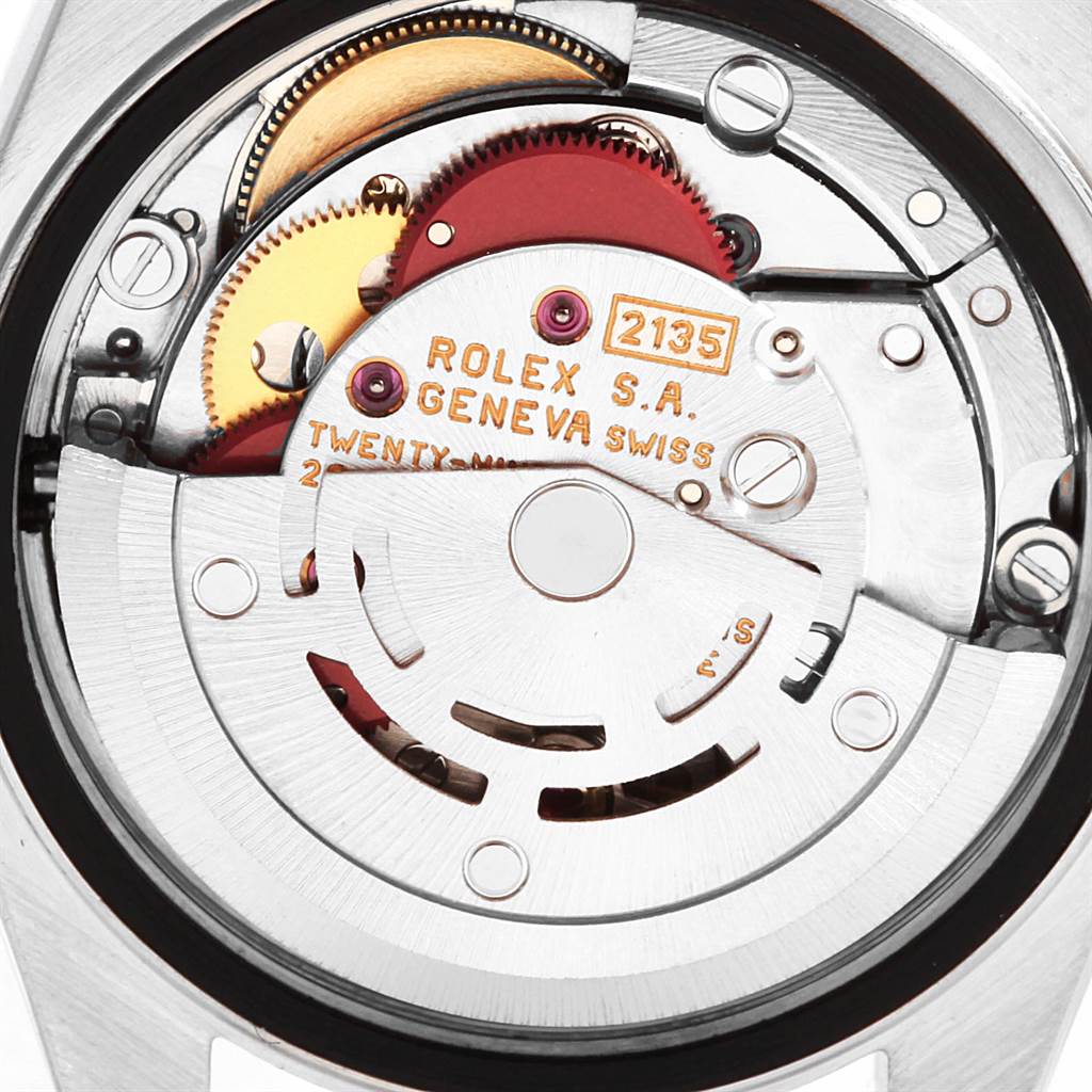 This image shows a close-up of the movement and inner mechanism of a Rolex Date 69240 Women's Stainless Steel Silver Dial 69240 Women's Stainless Steel Silver Dial model watch.