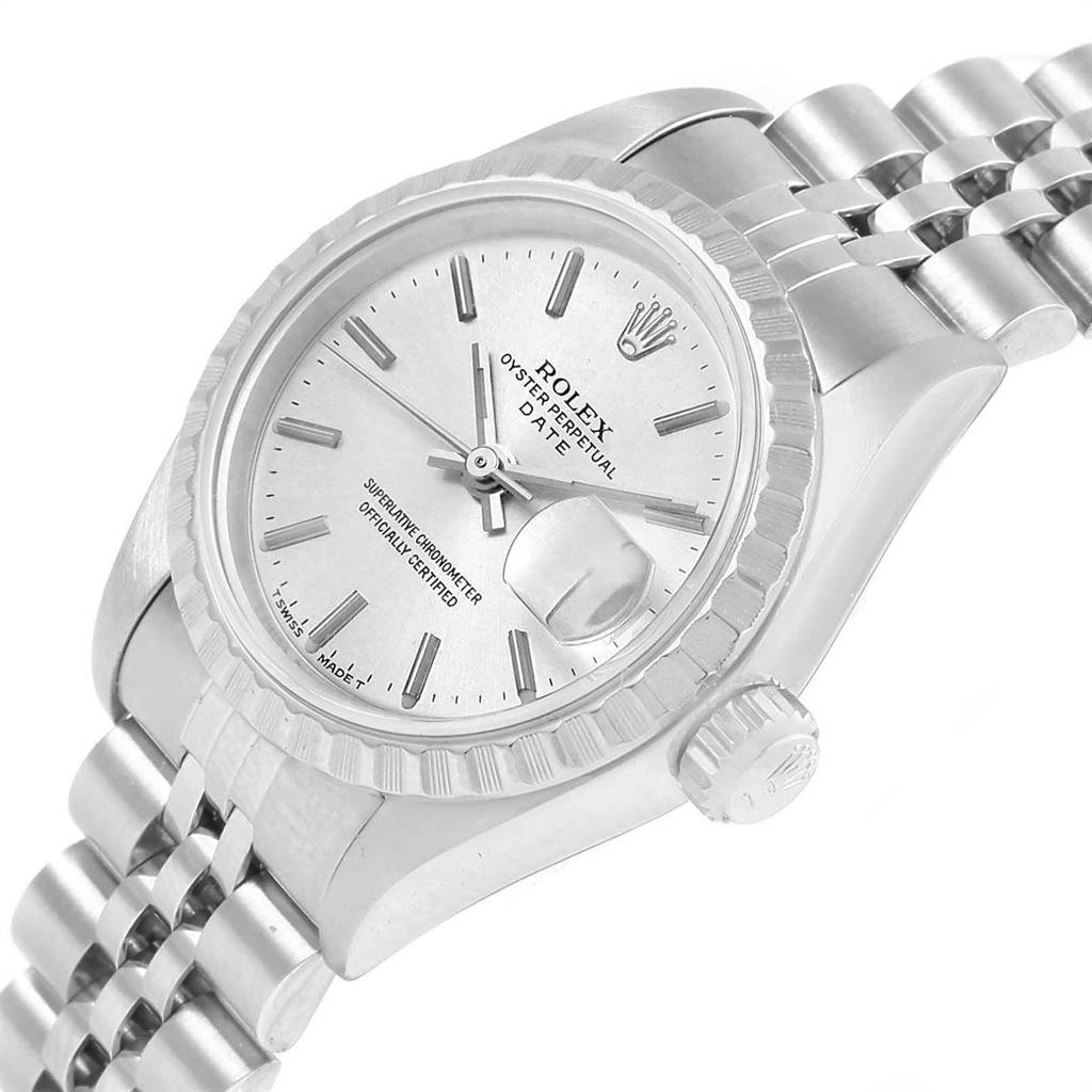 The image shows a close-up of the face and bracelet of a Rolex Oyster Perpetual Date watch at an angled view.