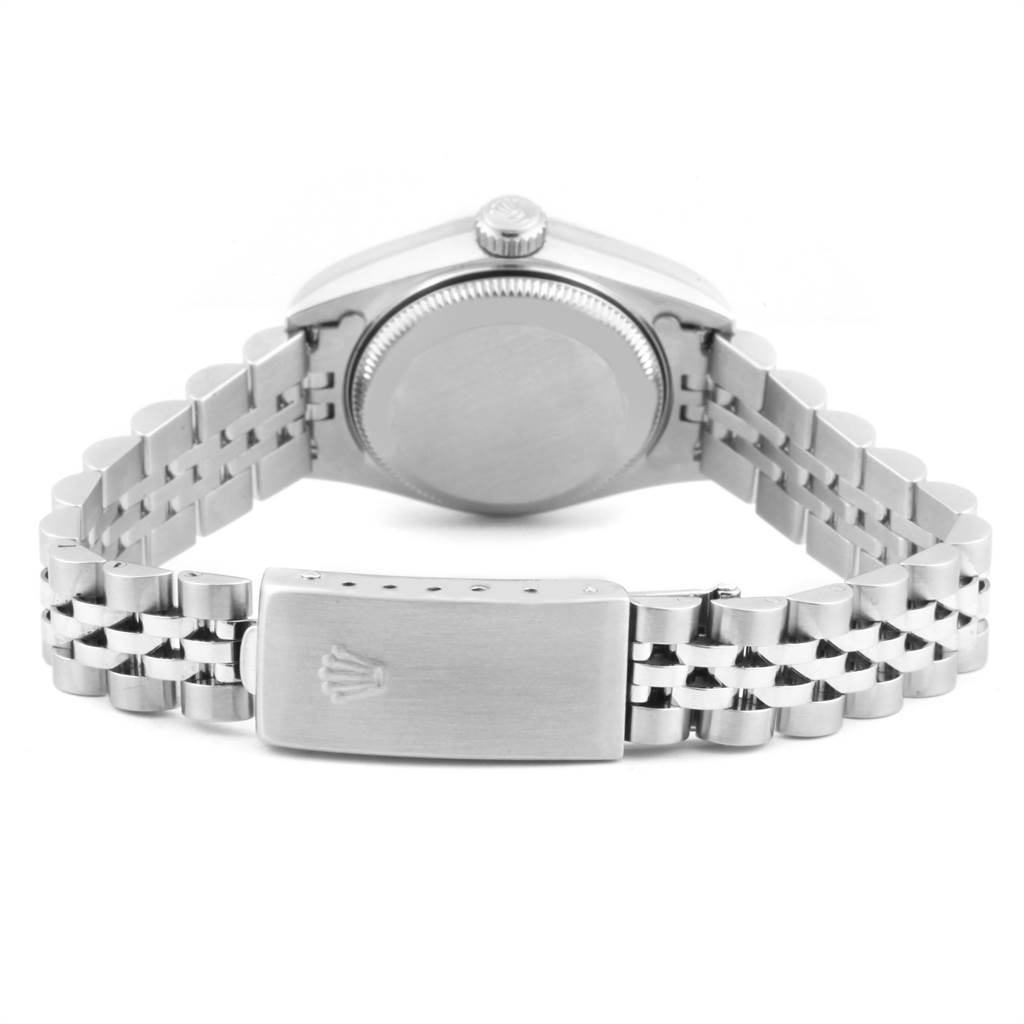 The image shows the back view of a Rolex Date 79174 Women's Stainless Steel Silver Dial 79174 Women's Stainless Steel Silver Dial model watch, highlighting the case back and the bracelet with clasp.