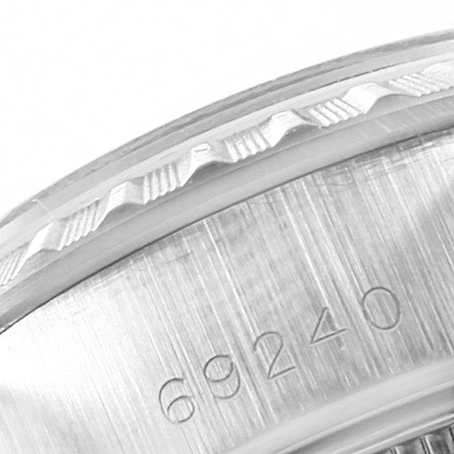 The image shows a close-up of the bezel and case with the model number 69240 of a Rolex Date 69240 Women's Stainless Steel White Dial 69240 Women's Stainless Steel White Dial watch.