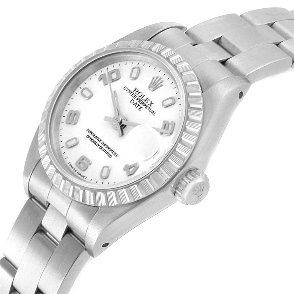 The image shows a Rolex Date 69240 Women's Stainless Steel White Dial 69240 Women's Stainless Steel White Dial model watch at an angled view highlighting the bezel, crown, bracelet, and part of the dial.