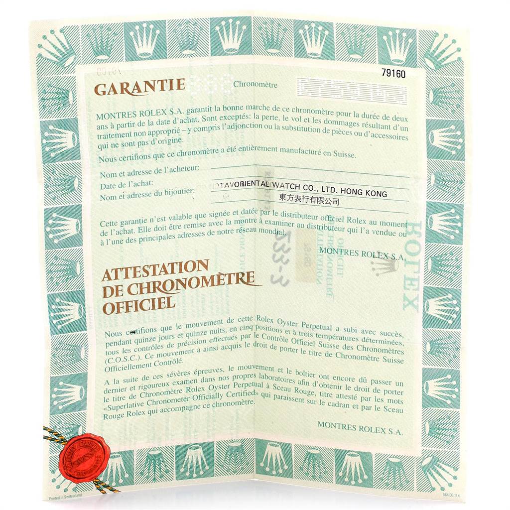 The image shows the warranty and chronometer certification papers for a Rolex Date 79160 Women's Stainless Steel Pink Dial 79160 Women's Stainless Steel Pink Dial model watch.