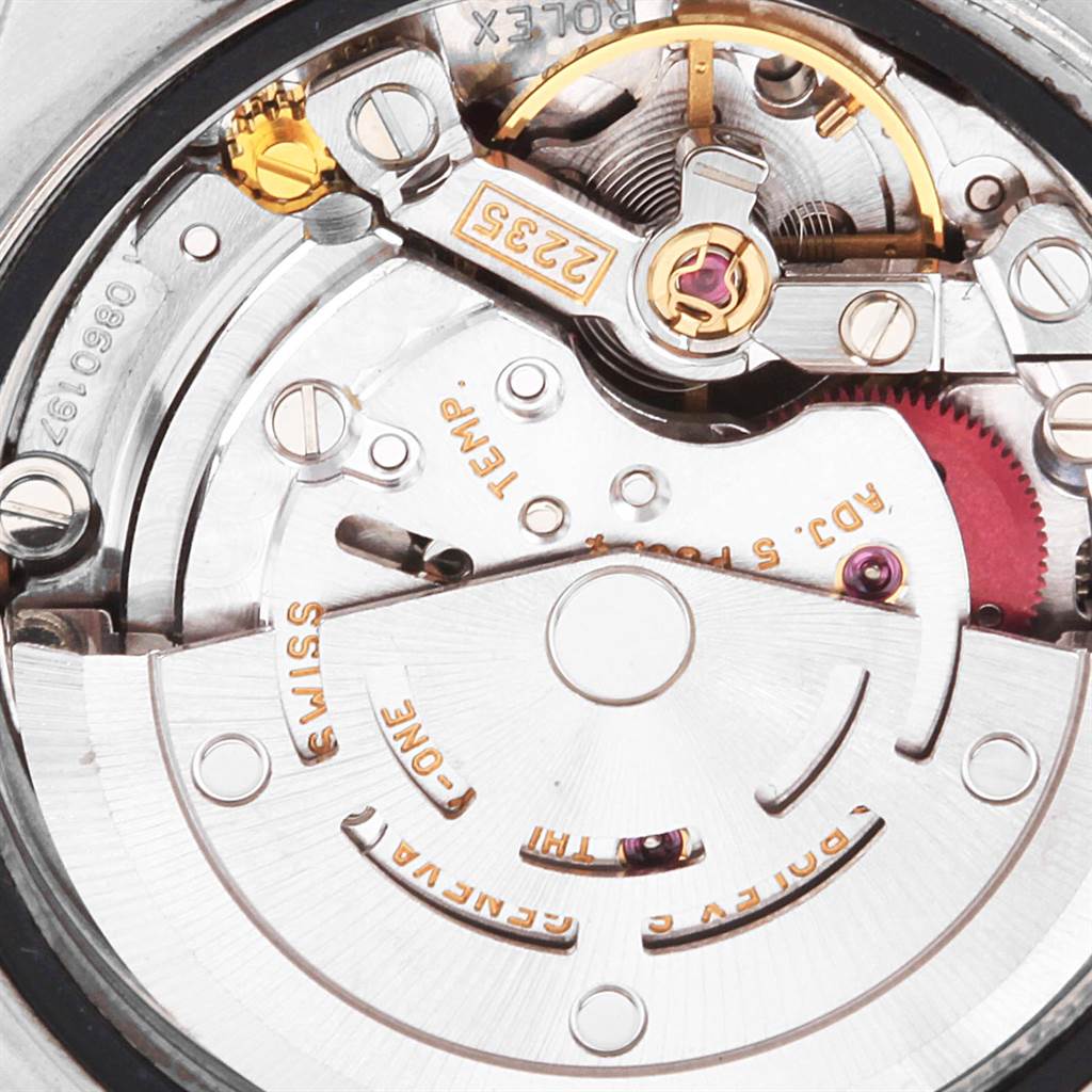 The image shows the intricate internal mechanics of the Rolex Date 79160 Women's Stainless Steel Pink Dial 79160 Women's Stainless Steel Pink Dial model watch, revealing gears and components from a close-up rear angle.