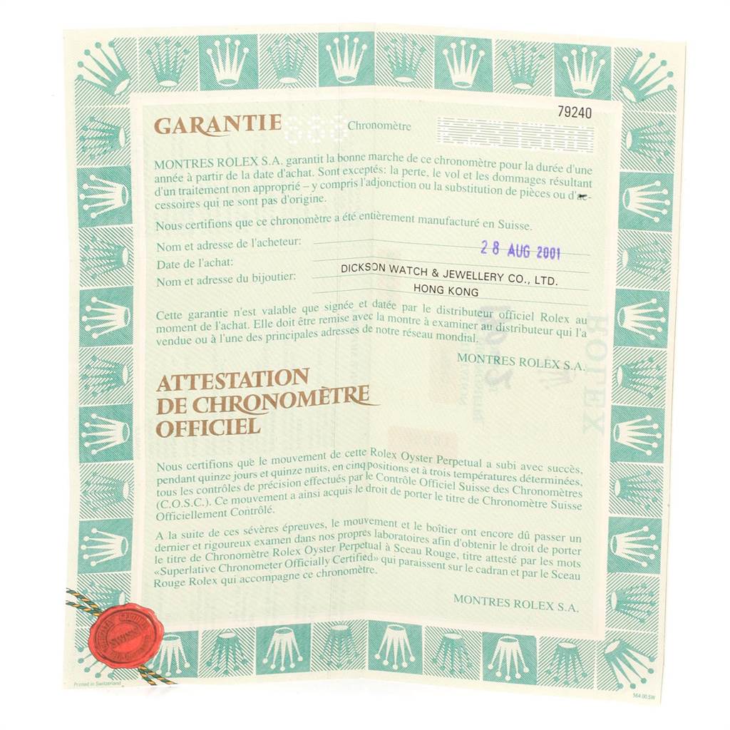 This image shows the warranty and official chronometer certification for the Rolex Date 79240 Women's Stainless Steel Black Dial 79240 Women's Stainless Steel Black Dial model.