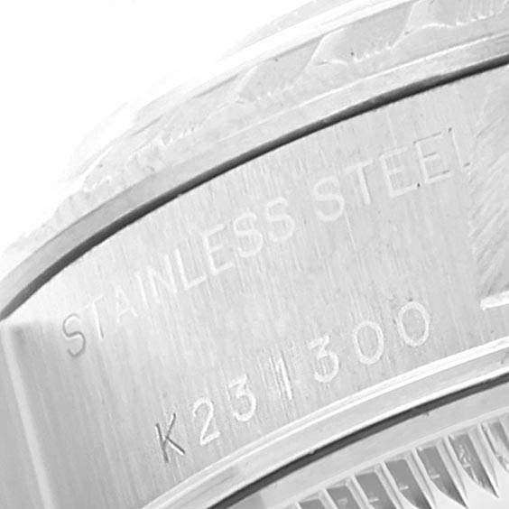 The image shows a close-up of the case back engraving on a stainless steel Rolex Date 79240 Women's Stainless Steel Black Dial 79240 Women's Stainless Steel Black Dial watch, revealing the model number.