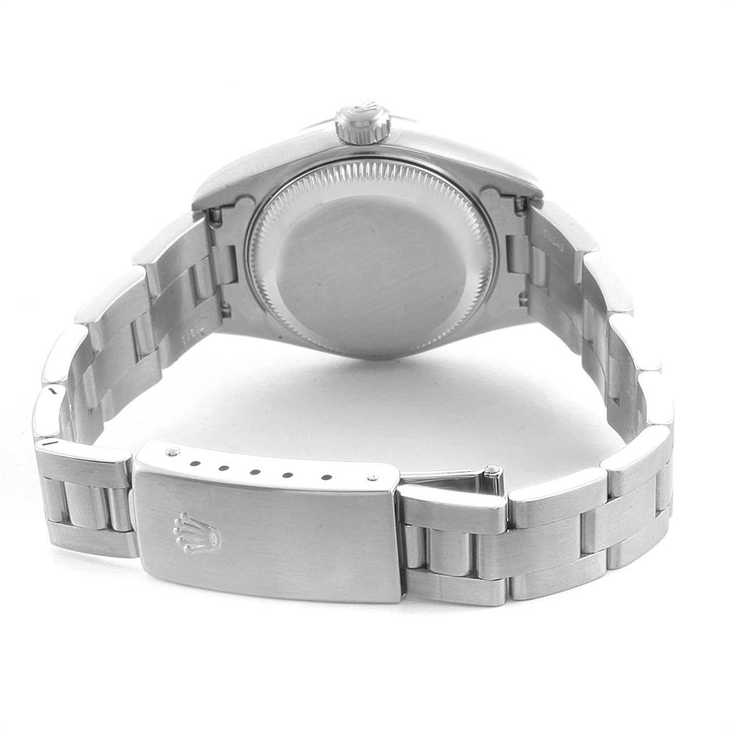 The image shows the back of a Rolex Date 79160 Women's Stainless Steel Blue Dial 79160 Women's Stainless Steel Blue Dial watch, highlighting its case back, bracelet, and clasp.