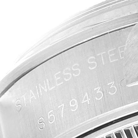 The image shows a close-up of the serial number and "STAINLESS STEEL" engraving on the side of a Rolex Date 69160 Women
s Stainless Steel Silver Dial 69160 Women
s Stainless Steel Silver Dial watch.