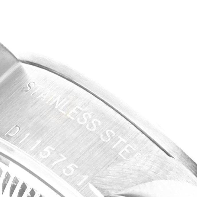 The image shows a close-up of the case back and serial number of the Rolex Date 79160 Women's Stainless Steel Pink Dial 79160 Women's Stainless Steel Pink Dial model watch.