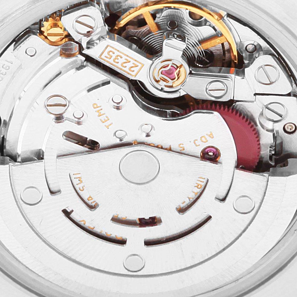 The image shows a close-up of the movement mechanism of a Rolex Date 79160 Women's Stainless Steel Pink Dial 79160 Women's Stainless Steel Pink Dial model watch.