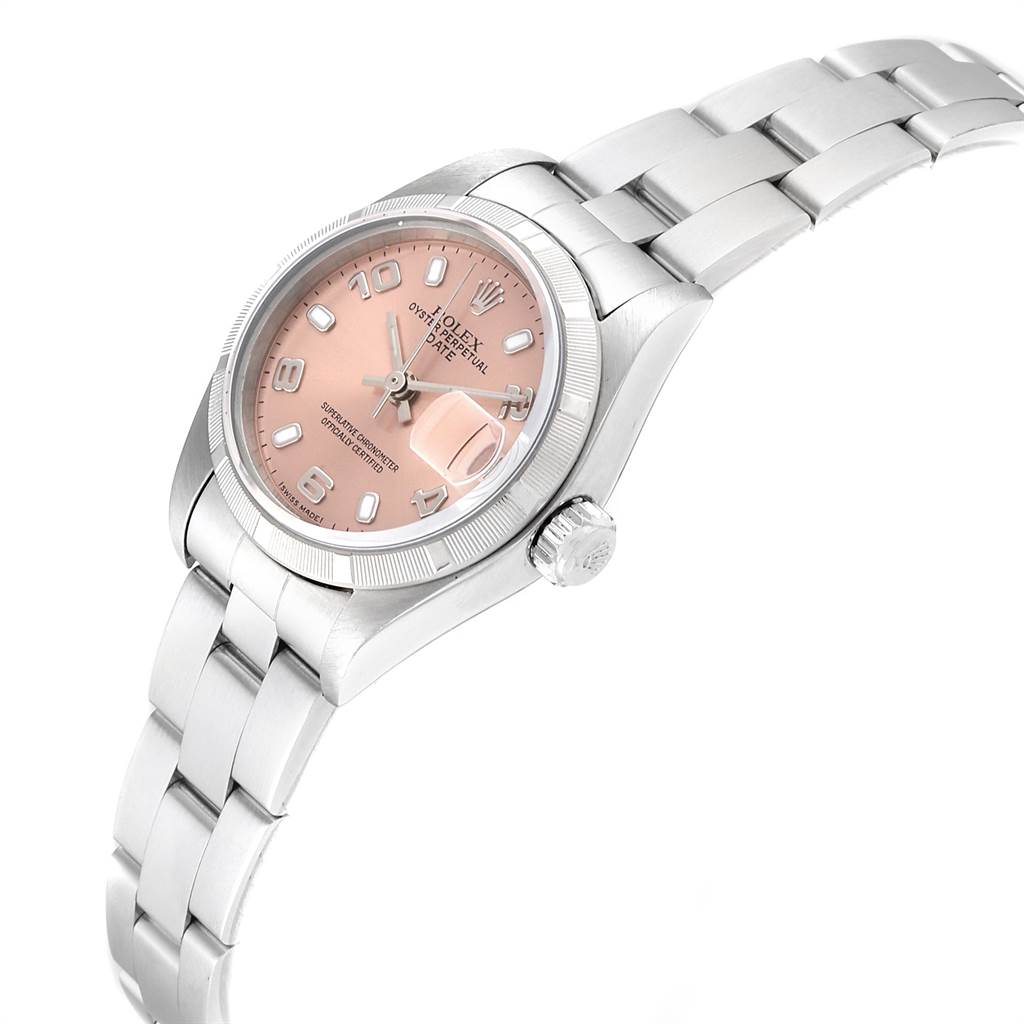 The image displays a Rolex Date 79190 Women
s Stainless Steel Pink Dial 79190 Women
s Stainless Steel Pink Dial model watch from a side angle, focusing on the dial, bezel, crown, and a portion of the bracelet.