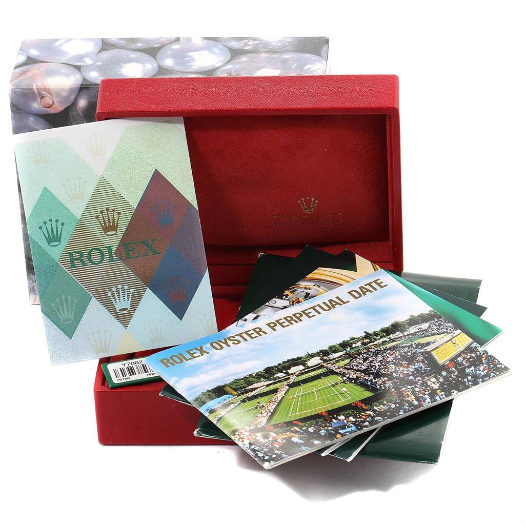 The image shows a Rolex Date 79160 Women
s Stainless Steel White Dial 79160 Women
s Stainless Steel White Dial model box with manuals and booklets partially out.