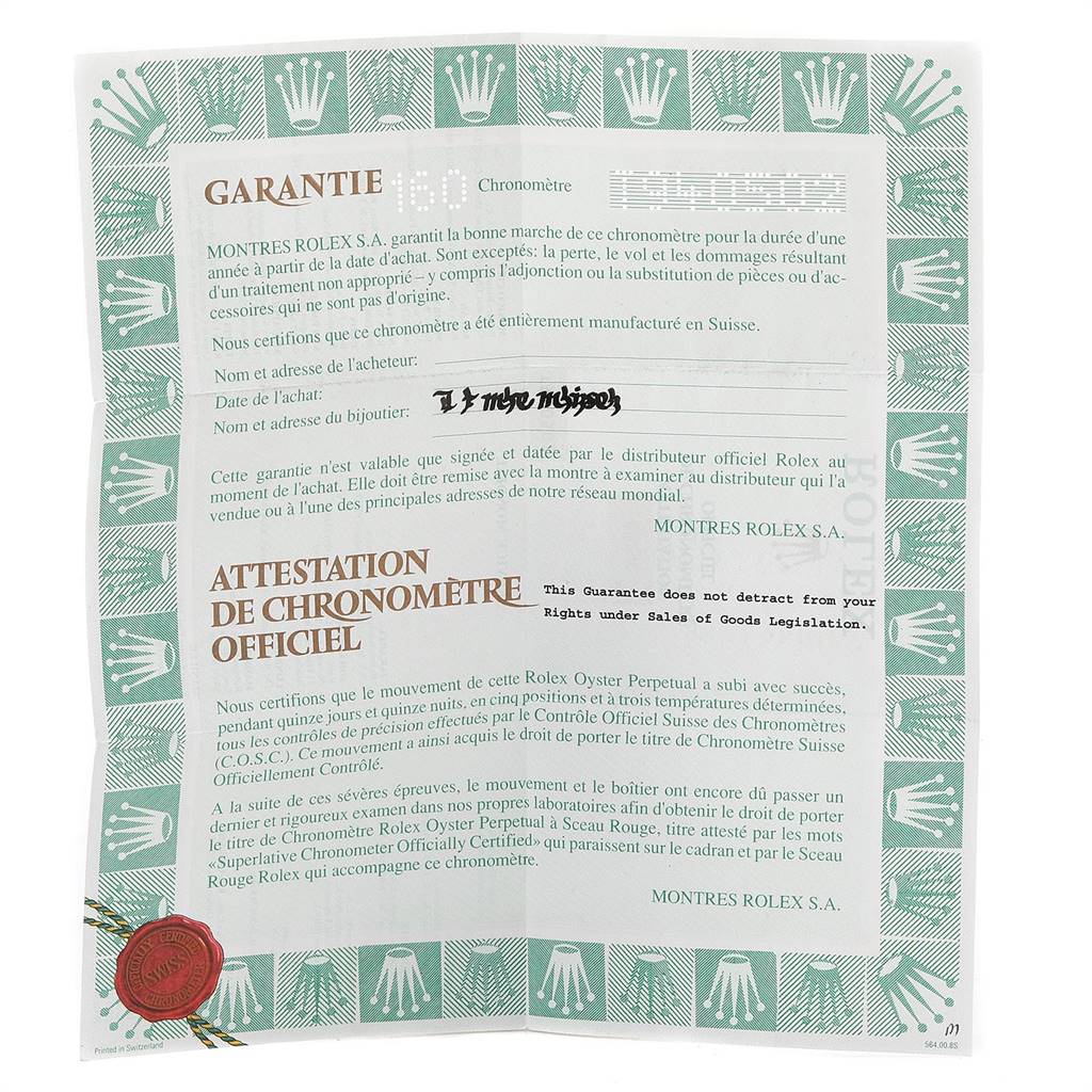 This image shows a warranty card and certificate for a Rolex Date 69240 Women's Stainless Steel White Dial 69240 Women's Stainless Steel White Dial model watch, detailing its chronometer certification.