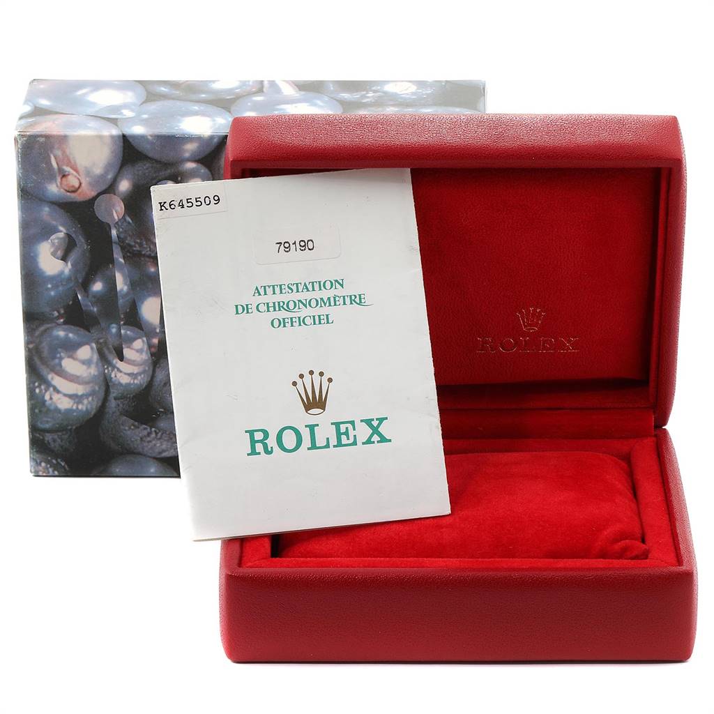 The image shows the open box and document with a Rolex Date 79190 Women
s Stainless Steel White Dial 79190 Women
s Stainless Steel White Dial model watch, viewed from the front.