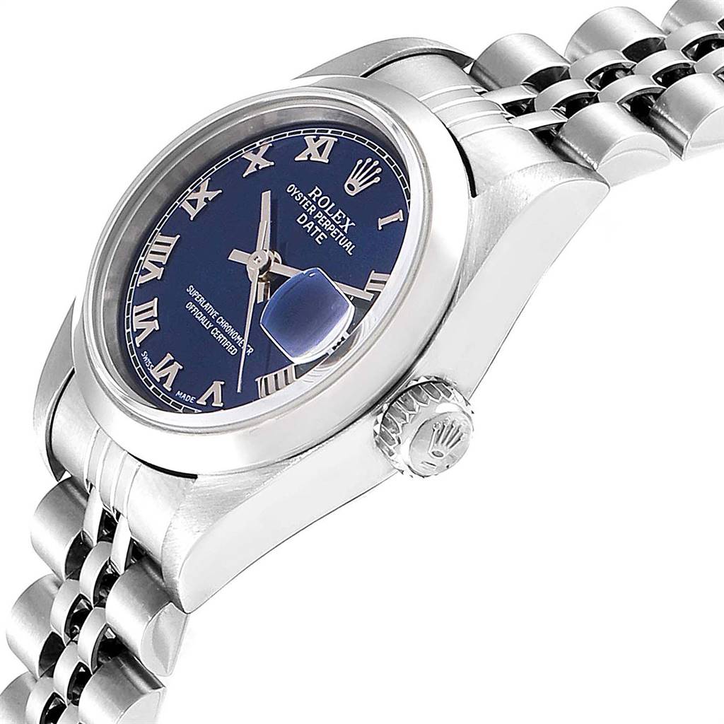 This image shows a Rolex Date 79160 Women
s Stainless Steel Blue Dial 79160 Women
s Stainless Steel Blue Dial model watch at an angled side view, highlighting the crown, bezel, and part of the bracelet.