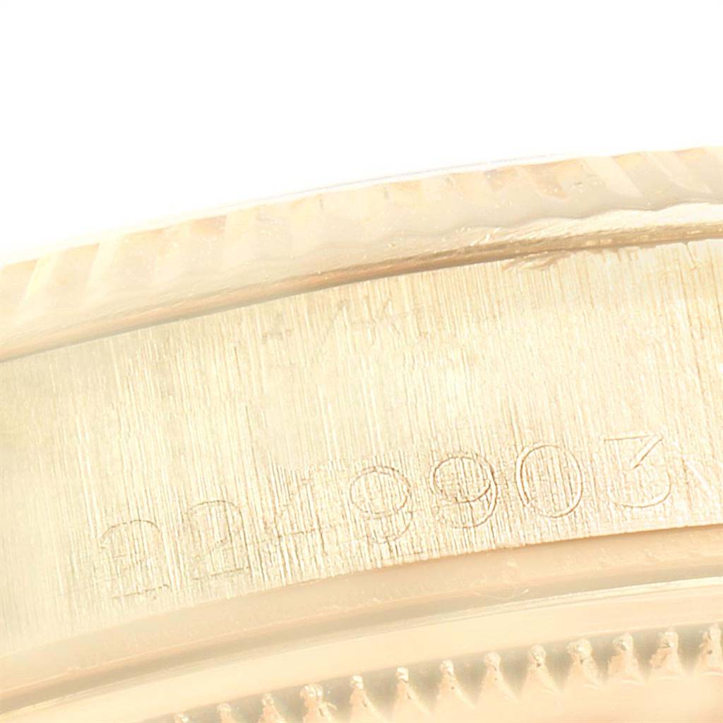 This close-up image shows the serial number engraved on the caseback of a Rolex Date 1503 Men's Yellow Gold Champagne Dial 1503 Men's Yellow Gold Champagne Dial model watch.