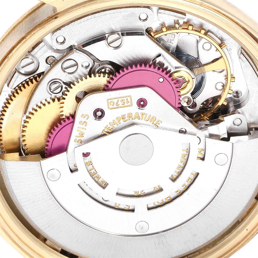 The image shows a close-up of the internal movement components of a Rolex Date 1503 Men's Yellow Gold Champagne Dial 1503 Men's Yellow Gold Champagne Dial model watch.