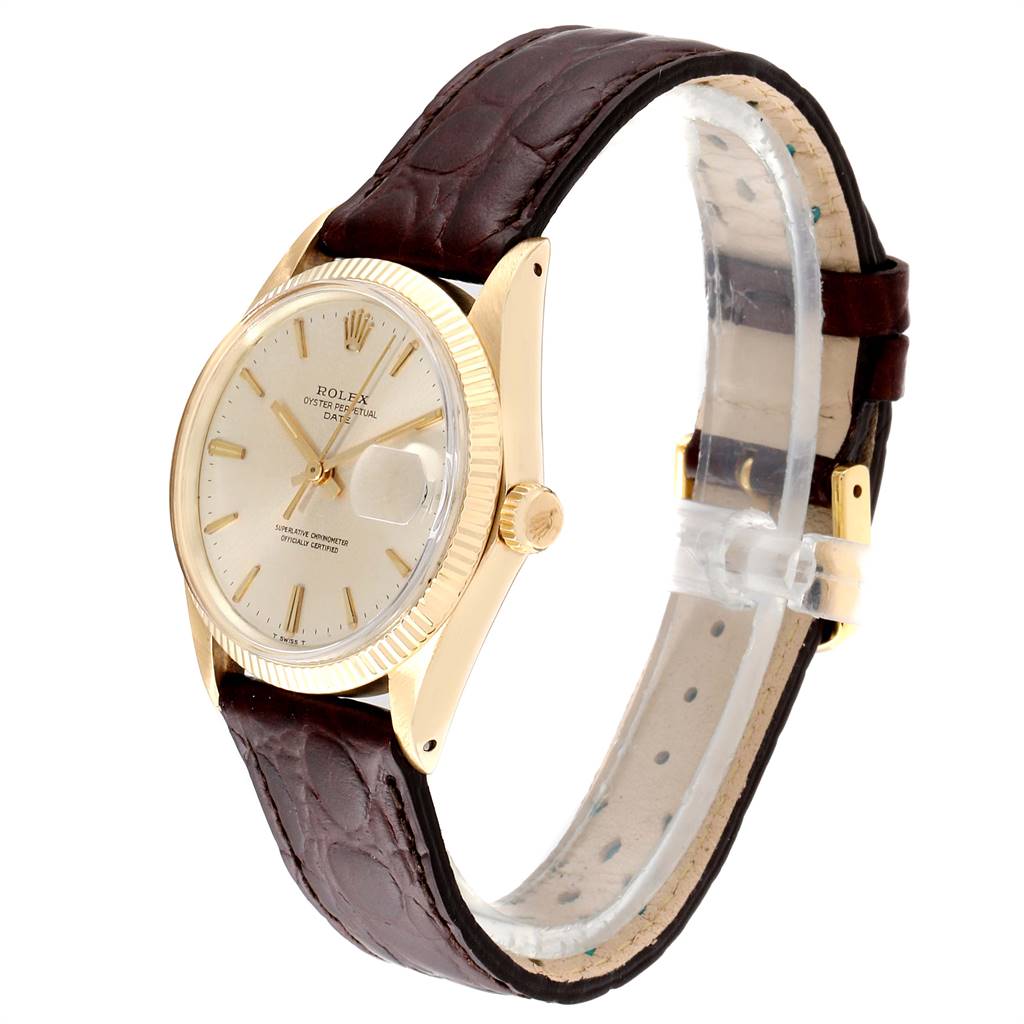 The Rolex Date 1503 Men's Yellow Gold Champagne Dial 1503 Men's Yellow Gold Champagne Dial model watch is shown from a front angle, highlighting its dial, bezel, crown, and leather strap.