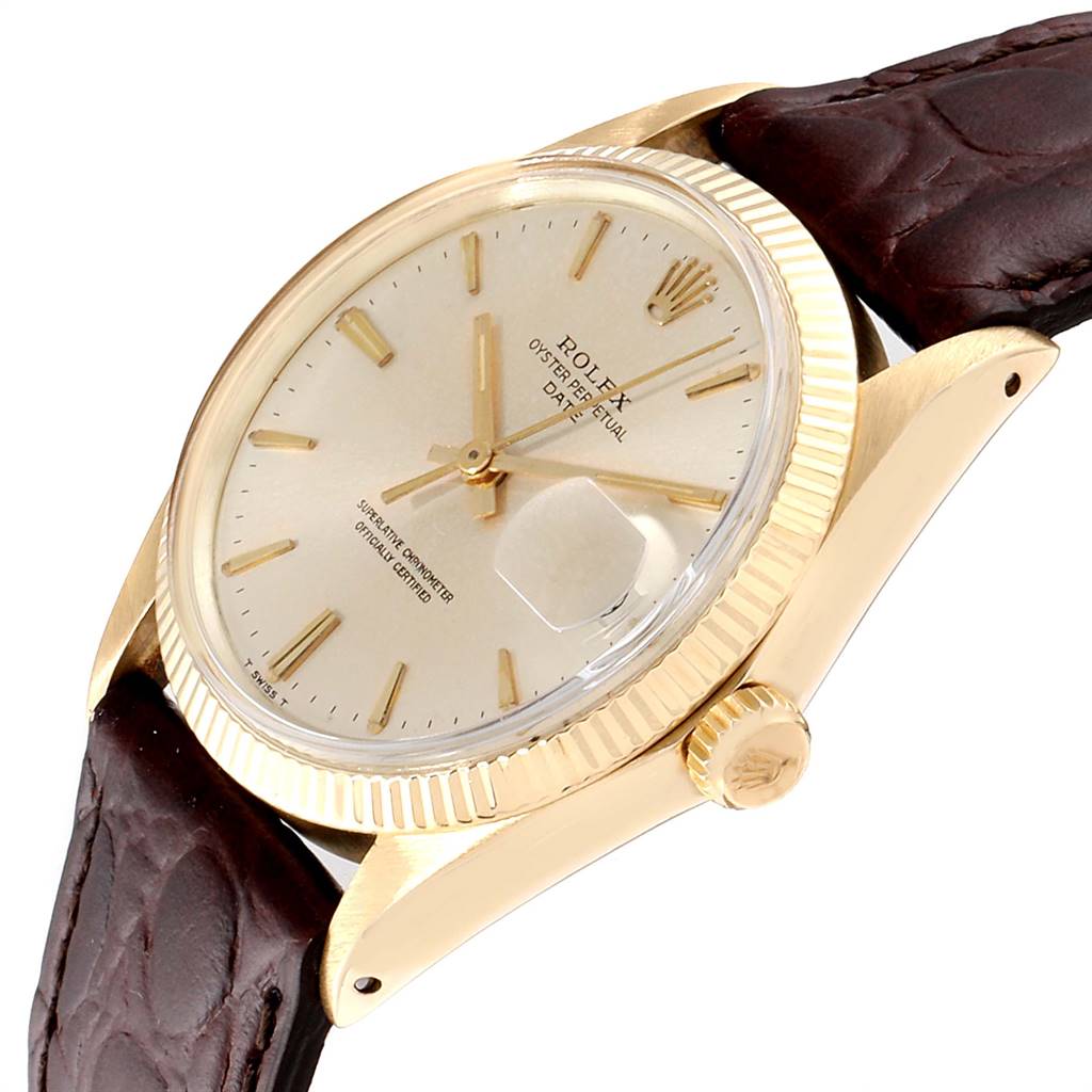 The image shows a side angle of a Rolex Date 1503 Men's Yellow Gold Champagne Dial 1503 Men's Yellow Gold Champagne Dial model, highlighting the dial, bezel, crown, and leather strap.