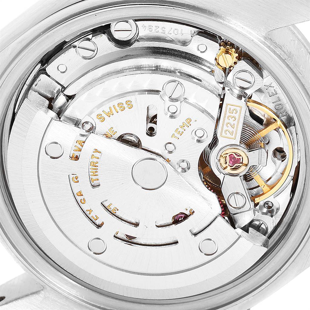 The image shows the movement mechanism of a Rolex Date 79190 Women
s Stainless Steel Pink Dial 79190 Women
s Stainless Steel Pink Dial model watch from a close-up angle.
