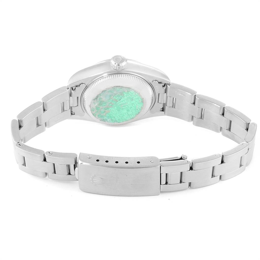 This image shows the back of a Rolex Date 79160 Women's Stainless Steel White Dial 79160 Women's Stainless Steel White Dial model watch, highlighting its metal bracelet and clasp.