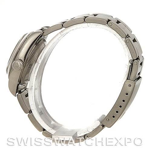 The image shows a side view of a Rolex Date 79160 Women's Stainless Steel Pink Dial 79160 Women's Stainless Steel Pink Dial model, focusing on the case, crown, and bracelet.