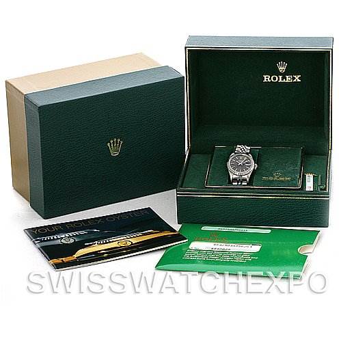The image shows a Rolex Date 69240 Women's Stainless Steel Grey Dial 69240 Women's Stainless Steel Grey Dial model watch with its box, papers, and accessories.