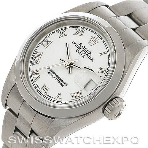 The Rolex Date 79160 Women
s Stainless Steel White Dial 79160 Women
s Stainless Steel White Dial model watch is shown at an angle displaying the face, Roman numeral dial, and part of the bracelet.