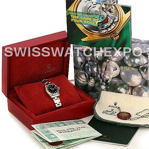 The image shows a Rolex Date 79190 Women's Stainless Steel Black Dial 79190 Women's Stainless Steel Black Dial watch at an angled view, along with its accessories including a box, manuals, and tags.