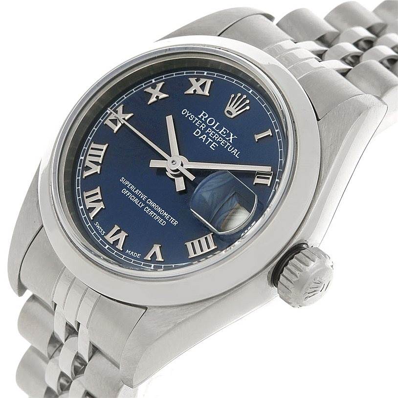 The Rolex Date 79160 Women's Stainless Steel Blue Dial 79160 Women's Stainless Steel Blue Dial watch is shown at a slight angle, highlighting its blue dial, crown, and part of the bracelet.
