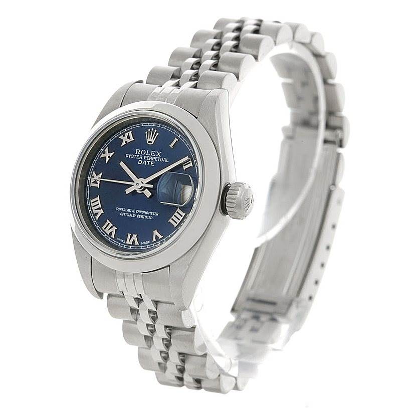 This image shows the Rolex Date 79160 Women's Stainless Steel Blue Dial 79160 Women's Stainless Steel Blue Dial watch at a slightly angled side view, featuring the dial, crown, and bracelet.