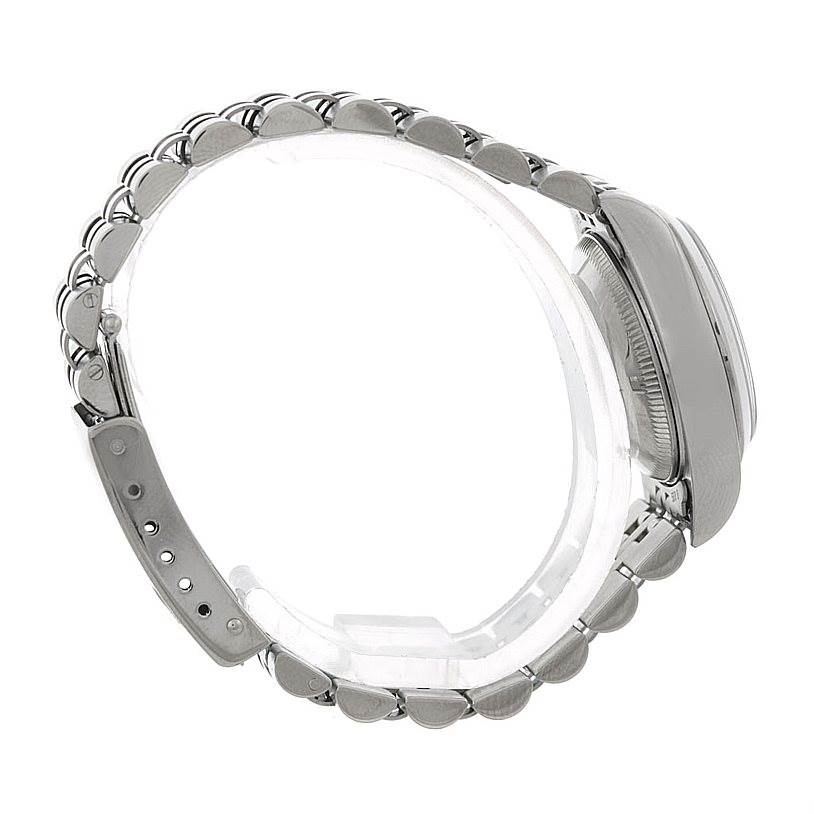 The image shows a side profile view of the Rolex Date 79160 Women's Stainless Steel Blue Dial 79160 Women's Stainless Steel Blue Dial model watch, focusing on its bracelet and case.