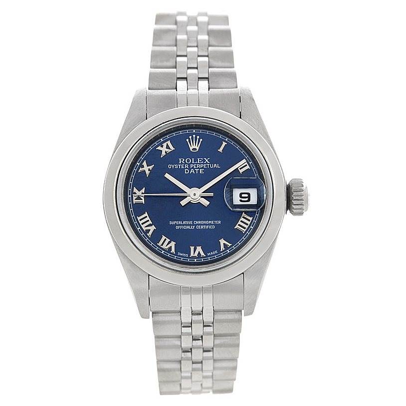 The image shows a front view of a Rolex Oyster Perpetual Date watch, highlighting the dial, hands, date window, and part of the bracelet.