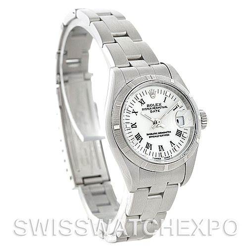 This image shows a white dial Date model Rolex watch at a three-quarter angle, displaying the face, bracelet, and clasp.