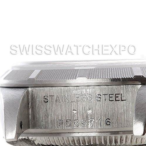 This image shows the side of a Rolex Date 79190 Women's Stainless Steel White Dial 79190 Women's Stainless Steel White Dial model watch, focusing on the stainless steel casing and serial number engraving.