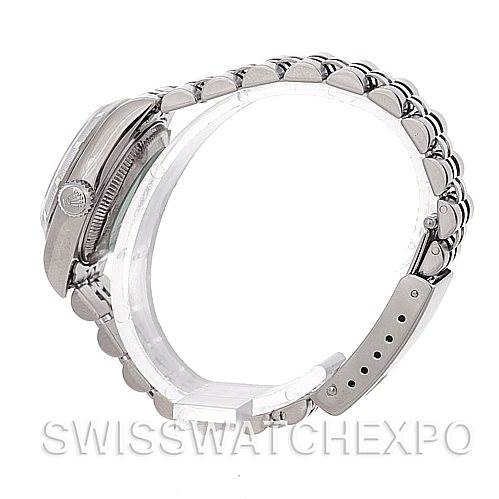 The image shows a side view of a Rolex Date 79190 Women's Stainless Steel White Dial 79190 Women's Stainless Steel White Dial model watch, highlighting the case, crown, and bracelet.