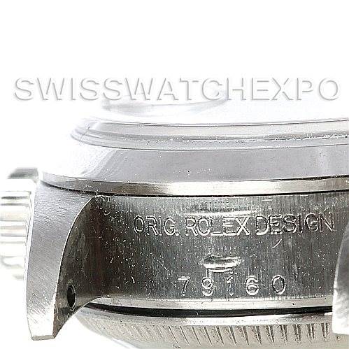 This image shows a close-up of the side of a Rolex Date 79160 Women's Stainless Steel Blue Dial 79160 Women's Stainless Steel Blue Dial model, focusing on the case and engravings.