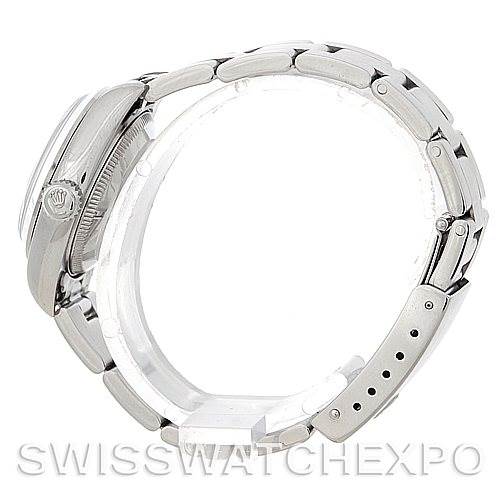 The image shows a side view of the Rolex Date 79160 Women's Stainless Steel Blue Dial 79160 Women's Stainless Steel Blue Dial model watch, highlighting the crown and part of the bracelet.